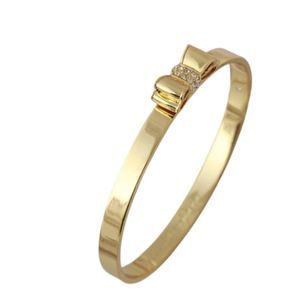 Kate Spade Gold Bow Slide on Bracelet with Dust Bag